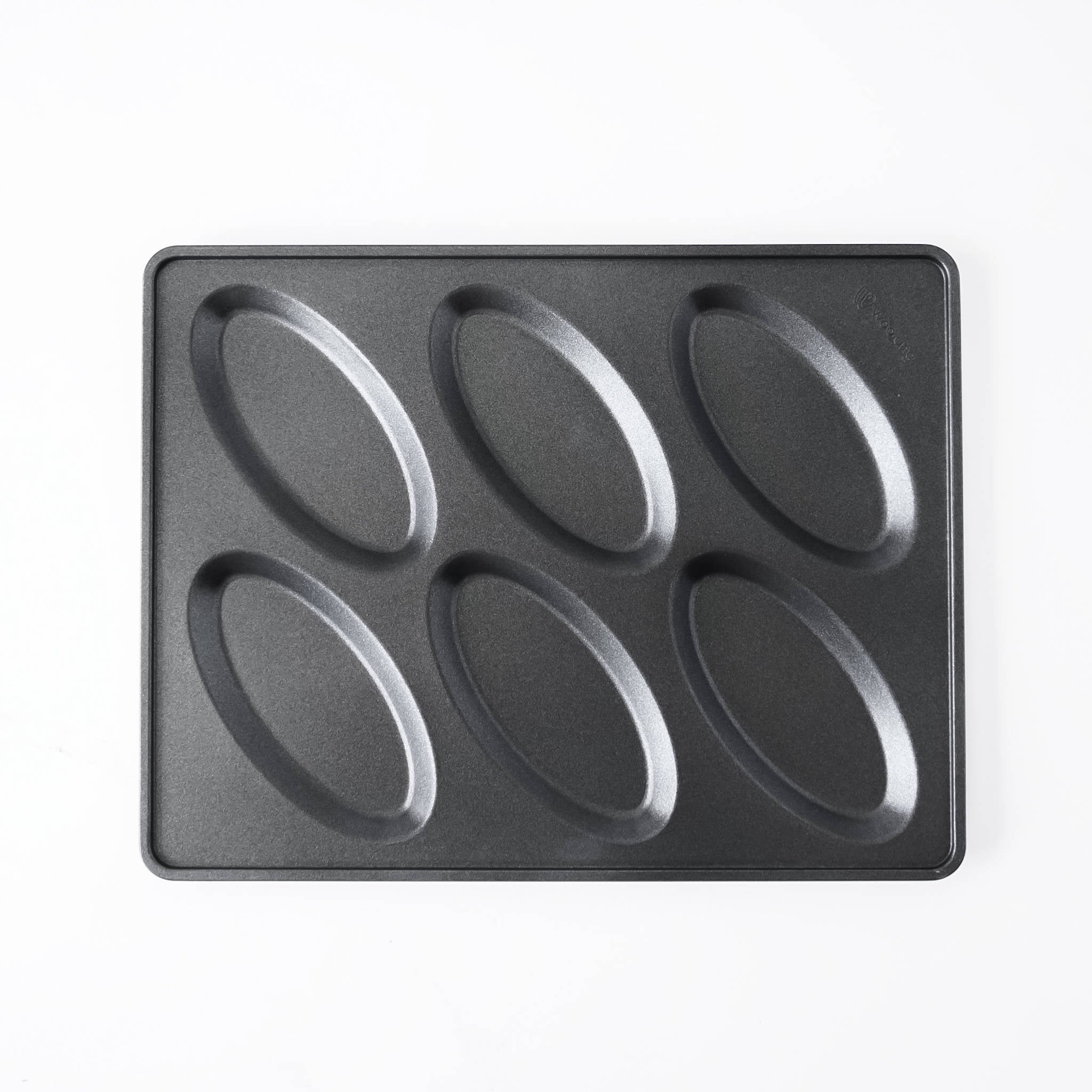 A black non-stick six-oval salt bread mold, photographed from directly above on a clean white background.