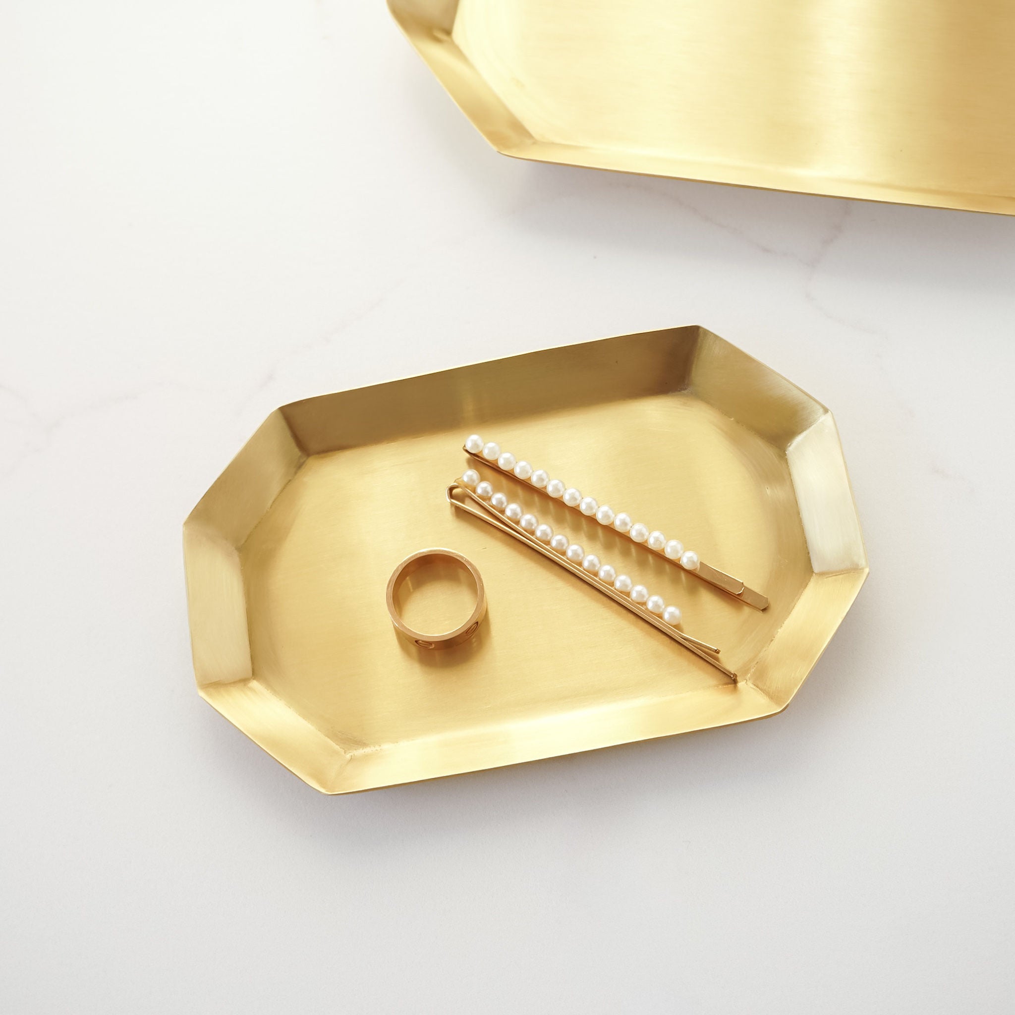 brass decorative tray in small, long octagon shaped