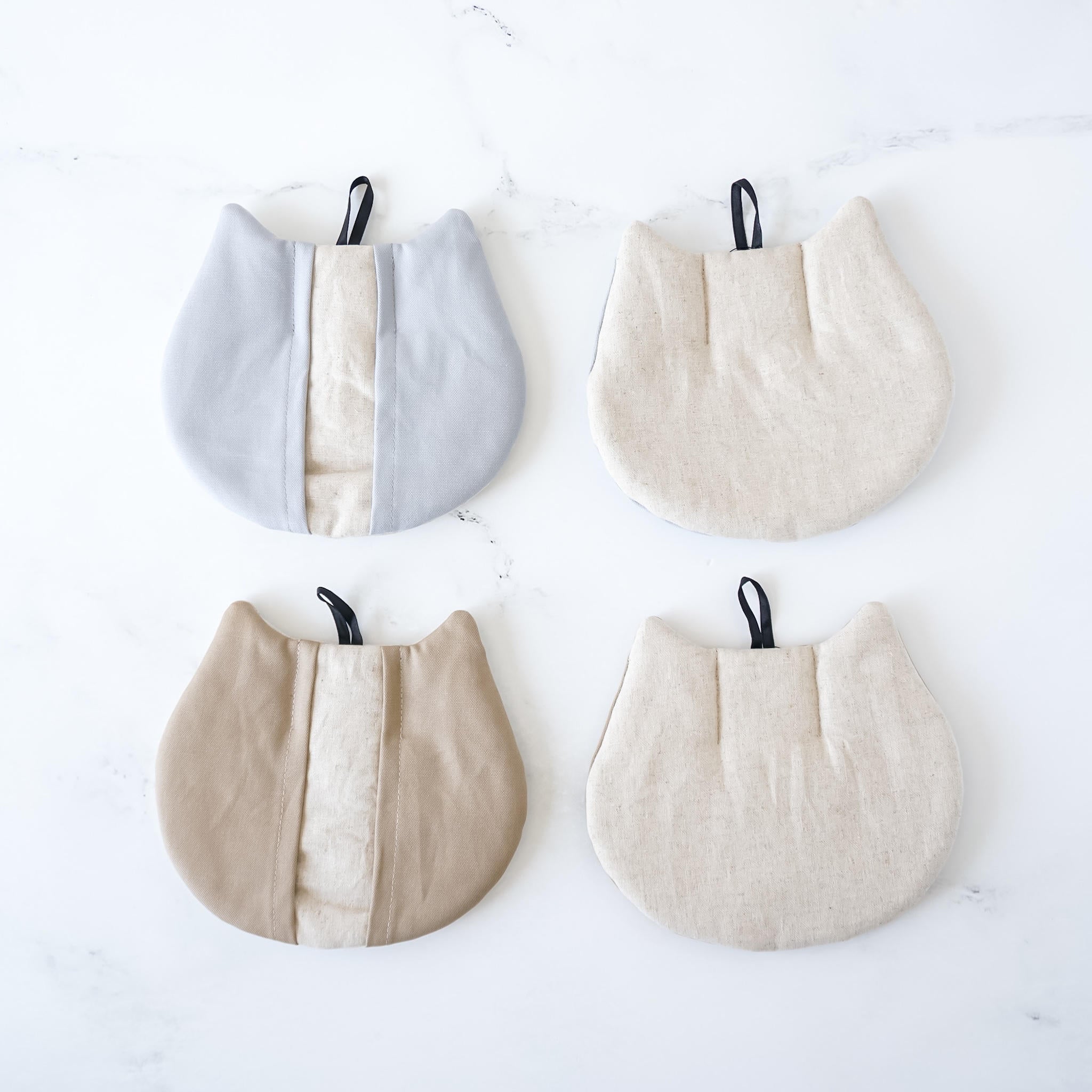 cat shaped oven mitts, pot holders in powder blue and beige