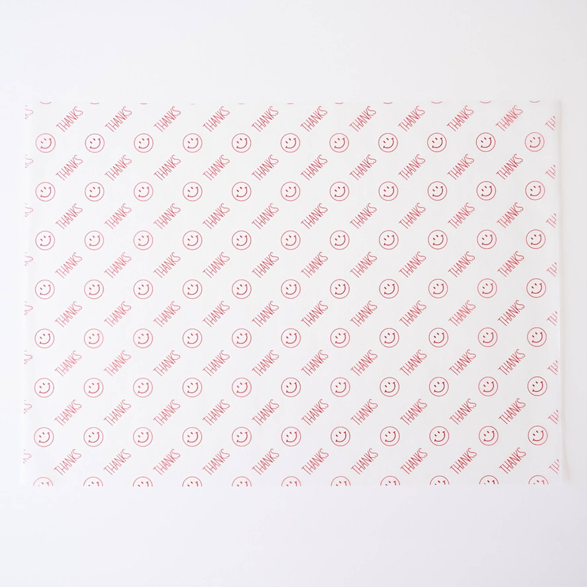 Semi-sheer deli paper with a red &