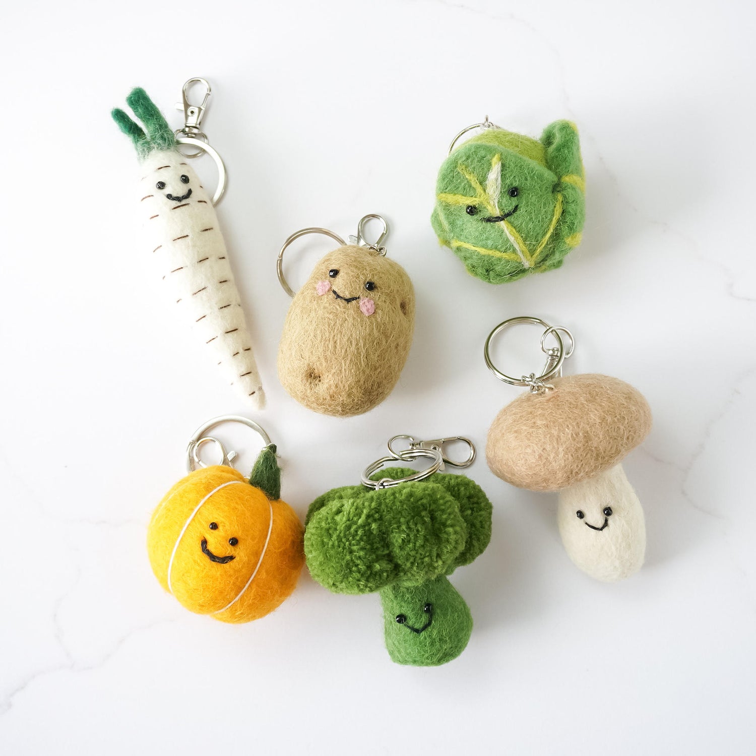 felt vegetable keyrings, carrot, broccoli, cabbage, mushroom, potato, pumpkin