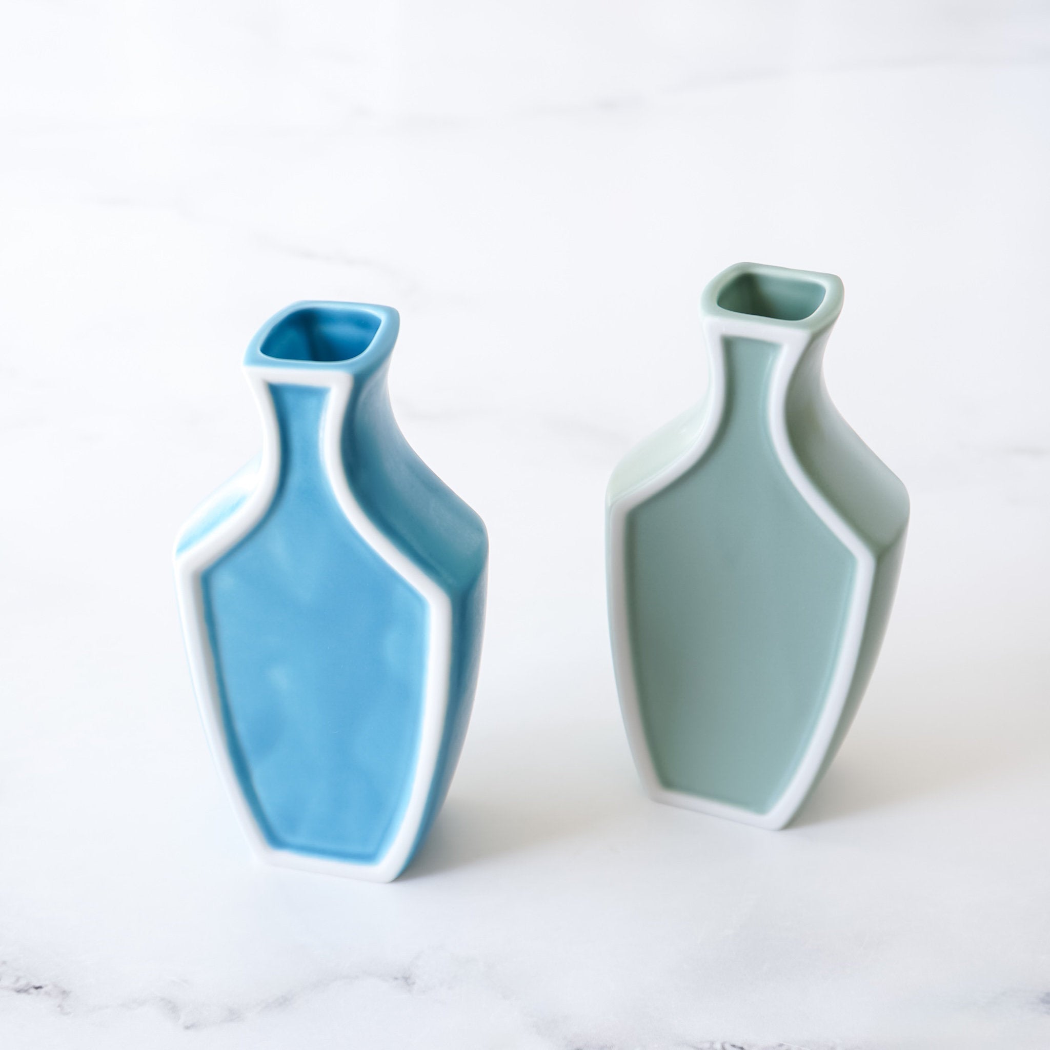 flower vases in turquoise blue and dusty mint