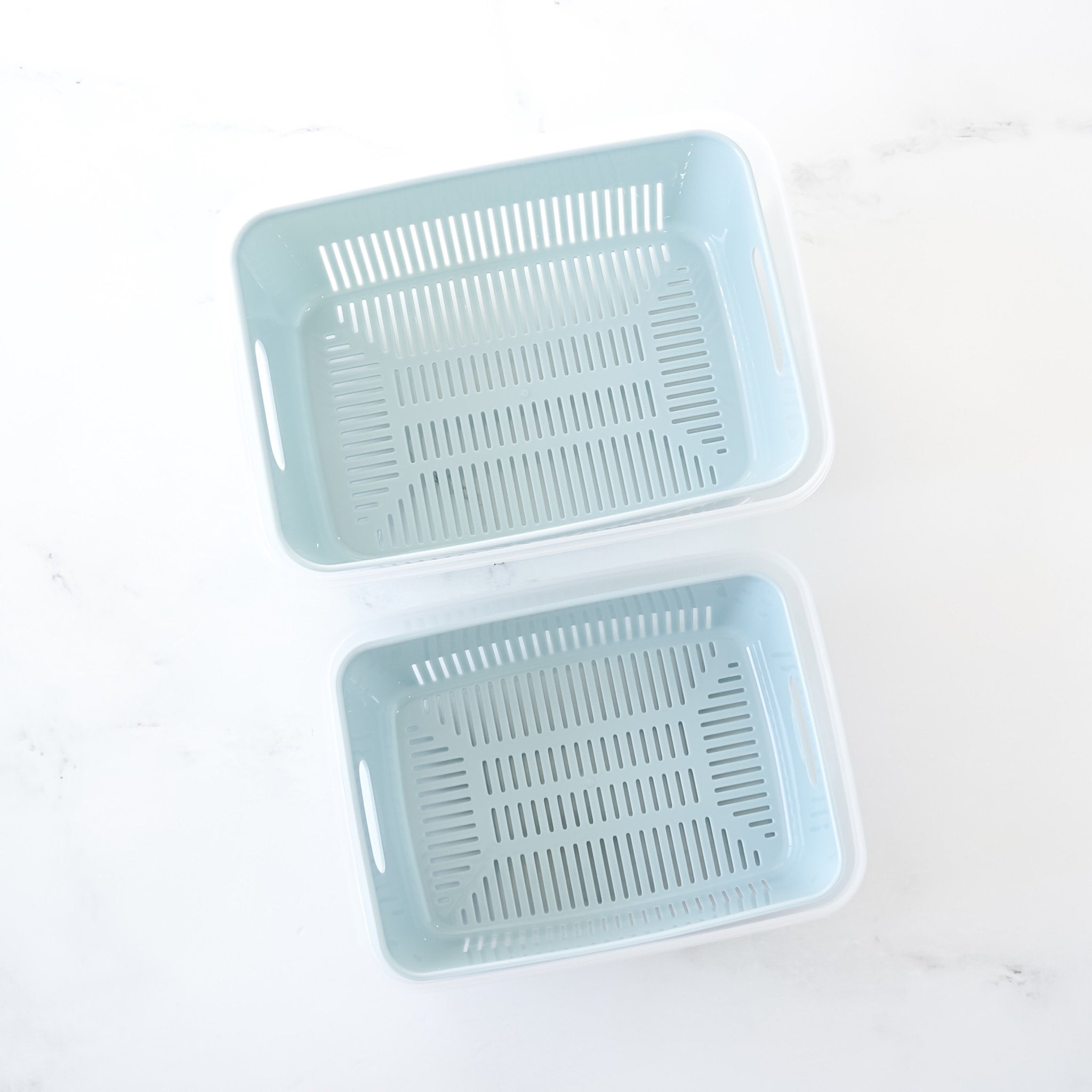 plastic fruit vegetable container with strainer and lid in blue
