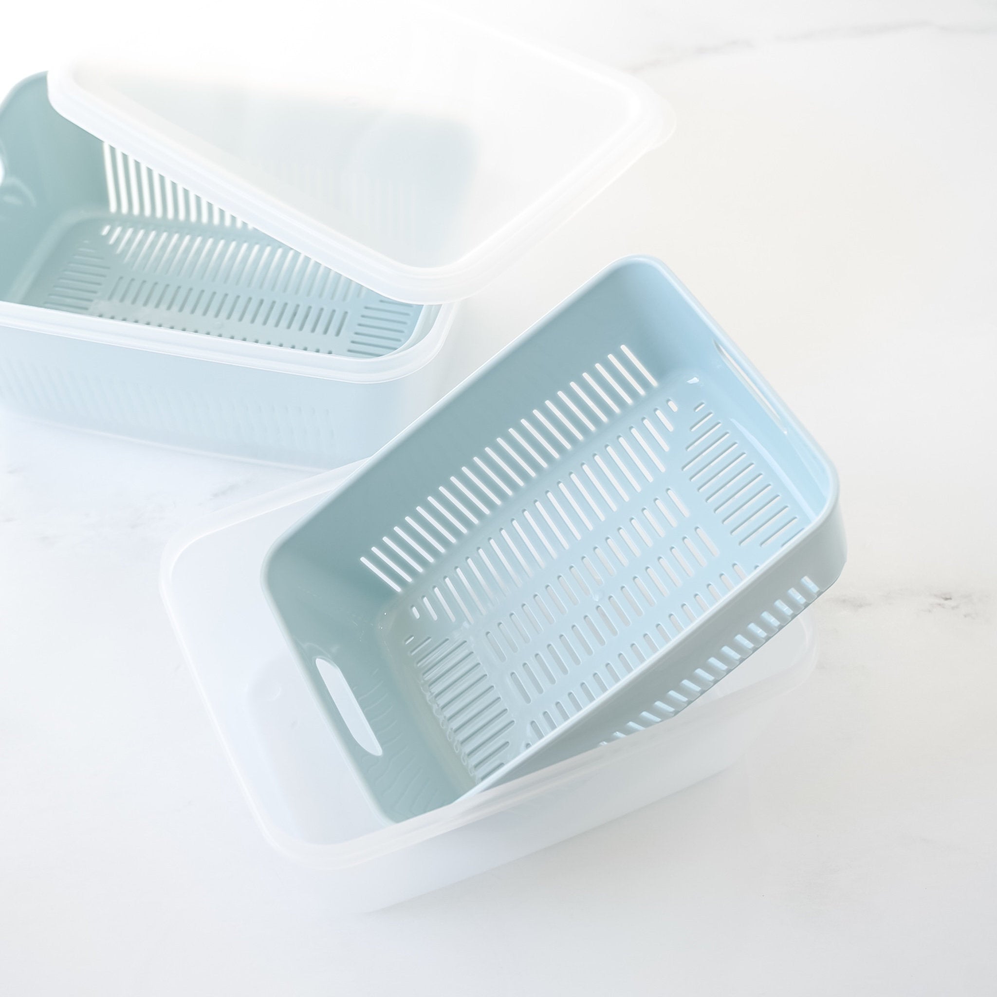 plastic fruit & vegetable storage with colander and lid in blue