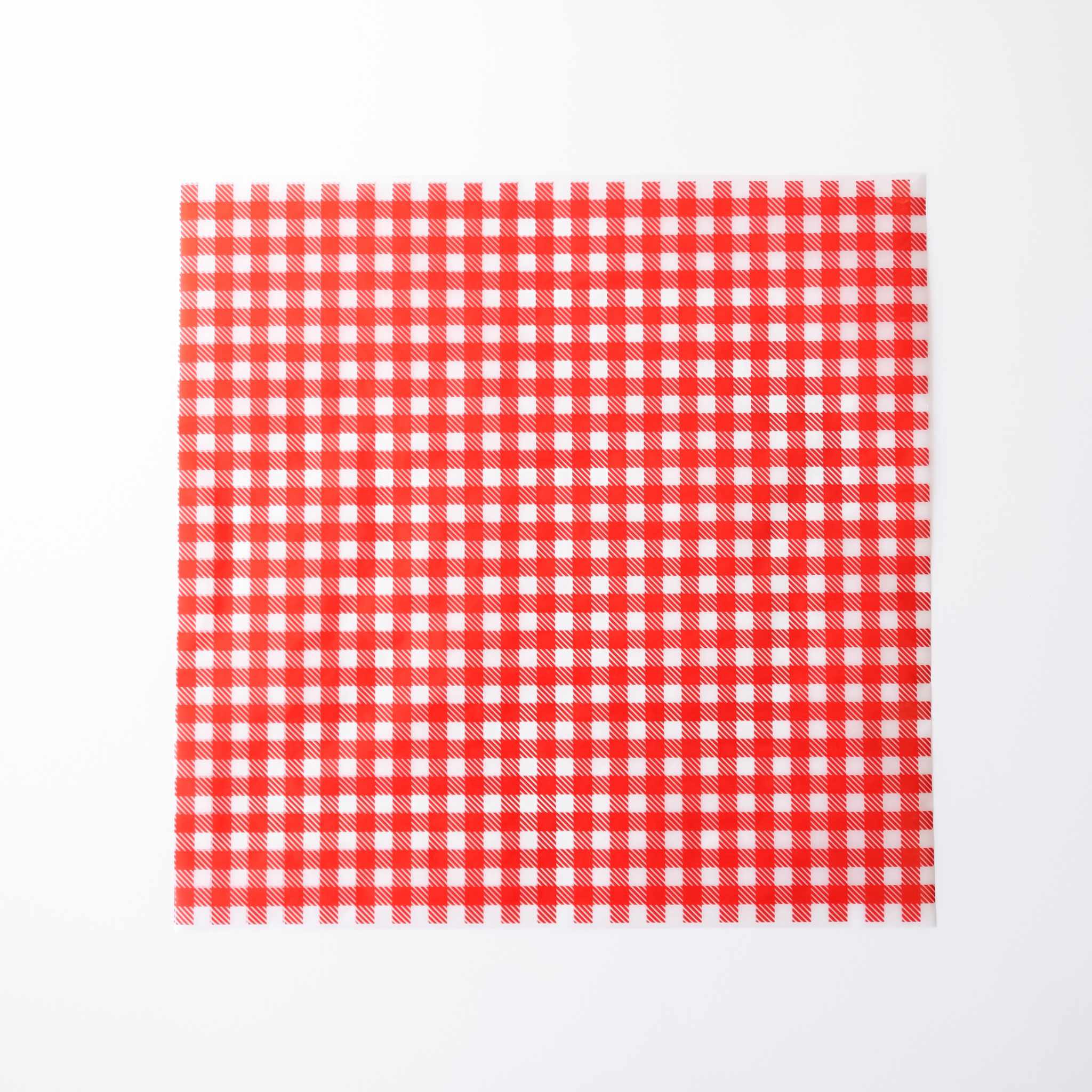 Red and white checkered parchment paper on a white background
