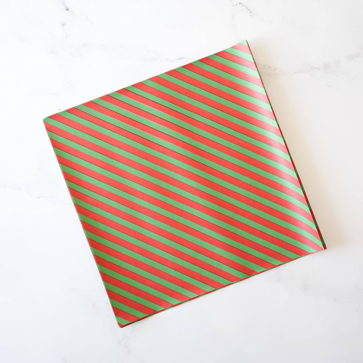 A deli paper with red and green stripes.