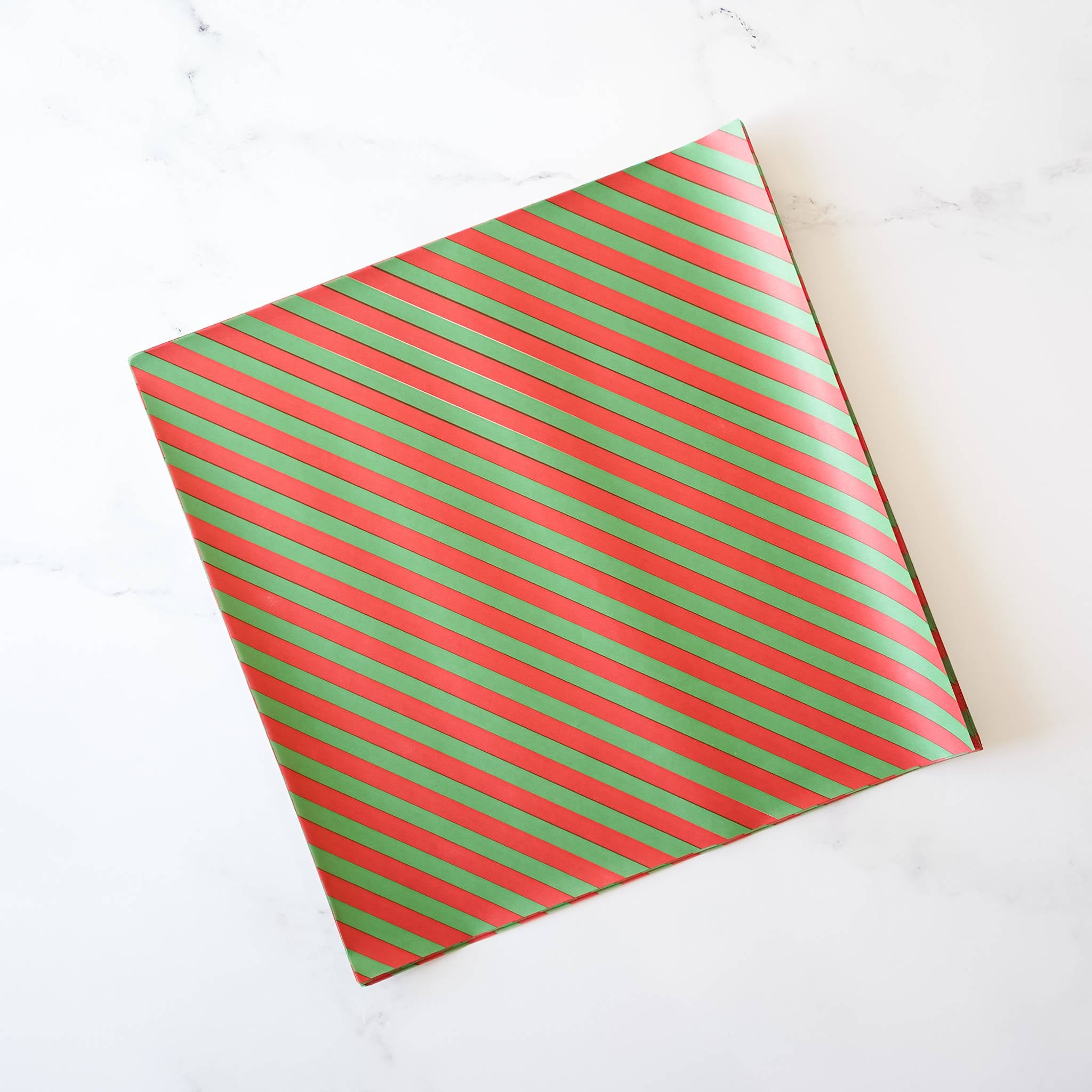 A deli paper with red and green stripes.