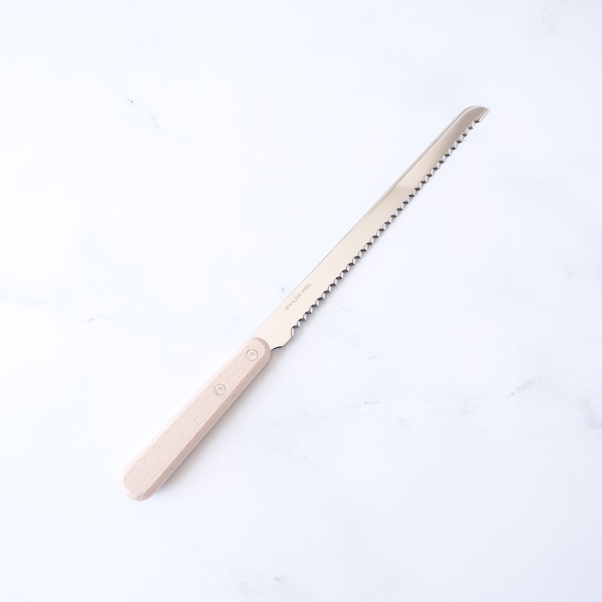 A compact bread knife with a wooden handle and a serrated stainless steel blade.