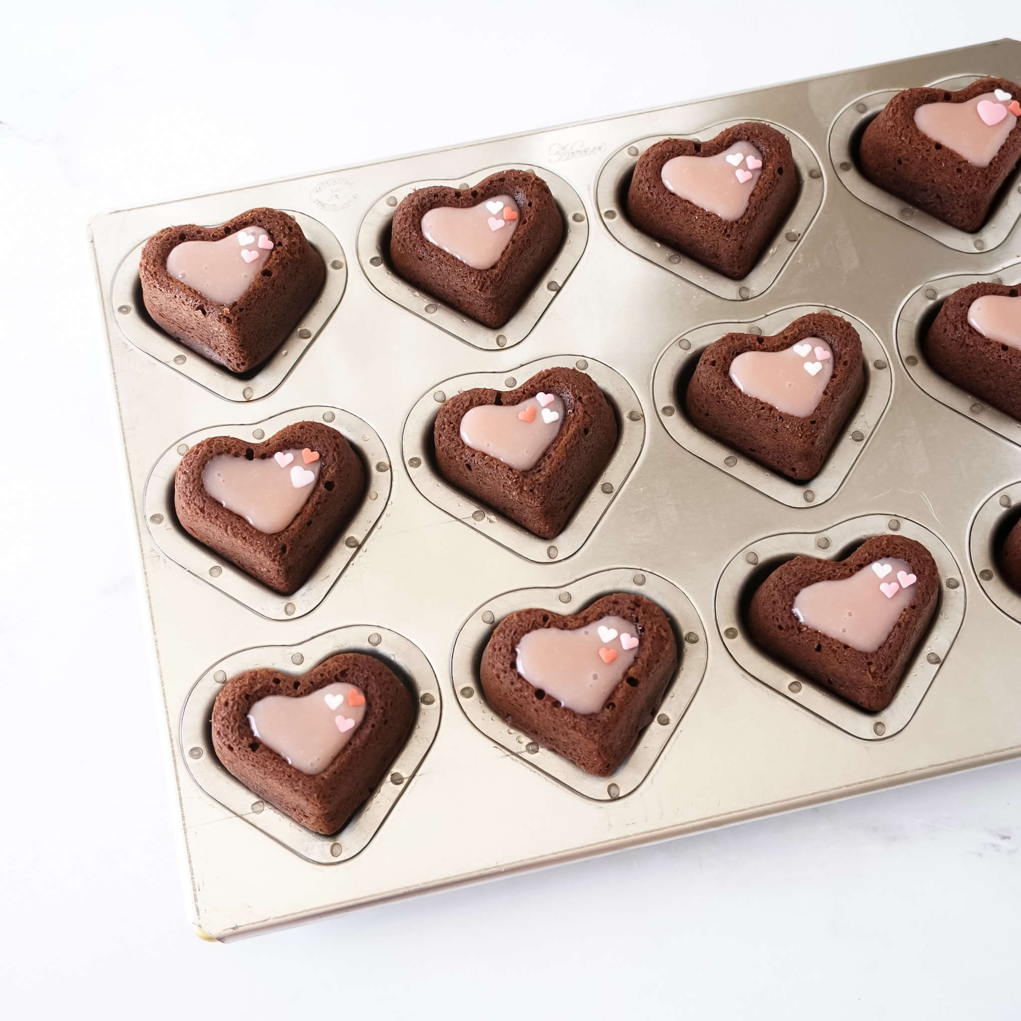 silicone coated heart shaped madeleine cookie baking pan, dark chocolate madeleines