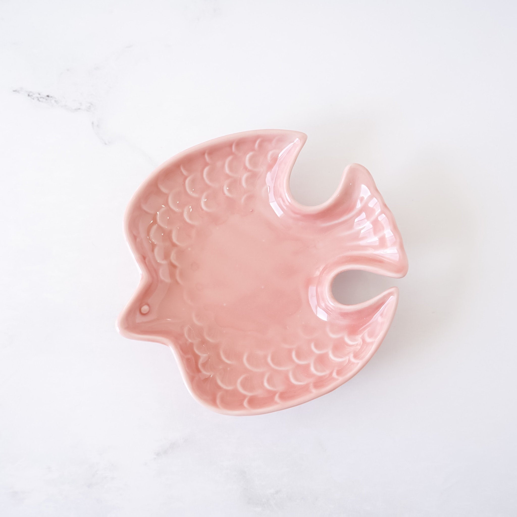 small bird shaped jewelry dish in rose pink