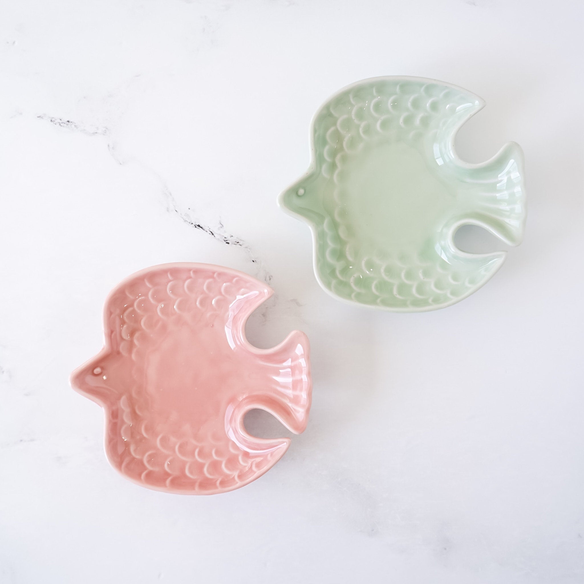 small bird shaped plates in pink, celadon green