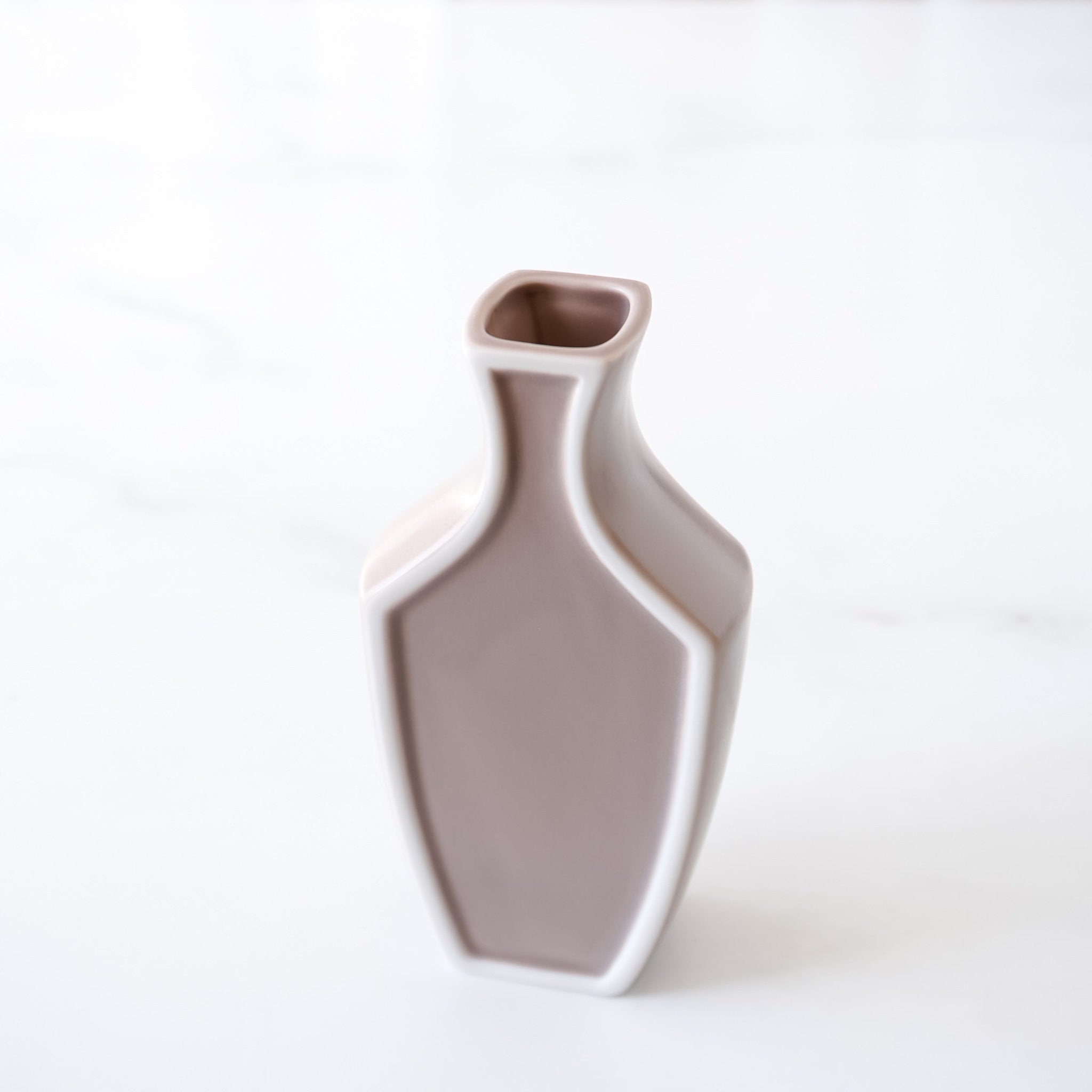 small ceramic vase in mushroom color