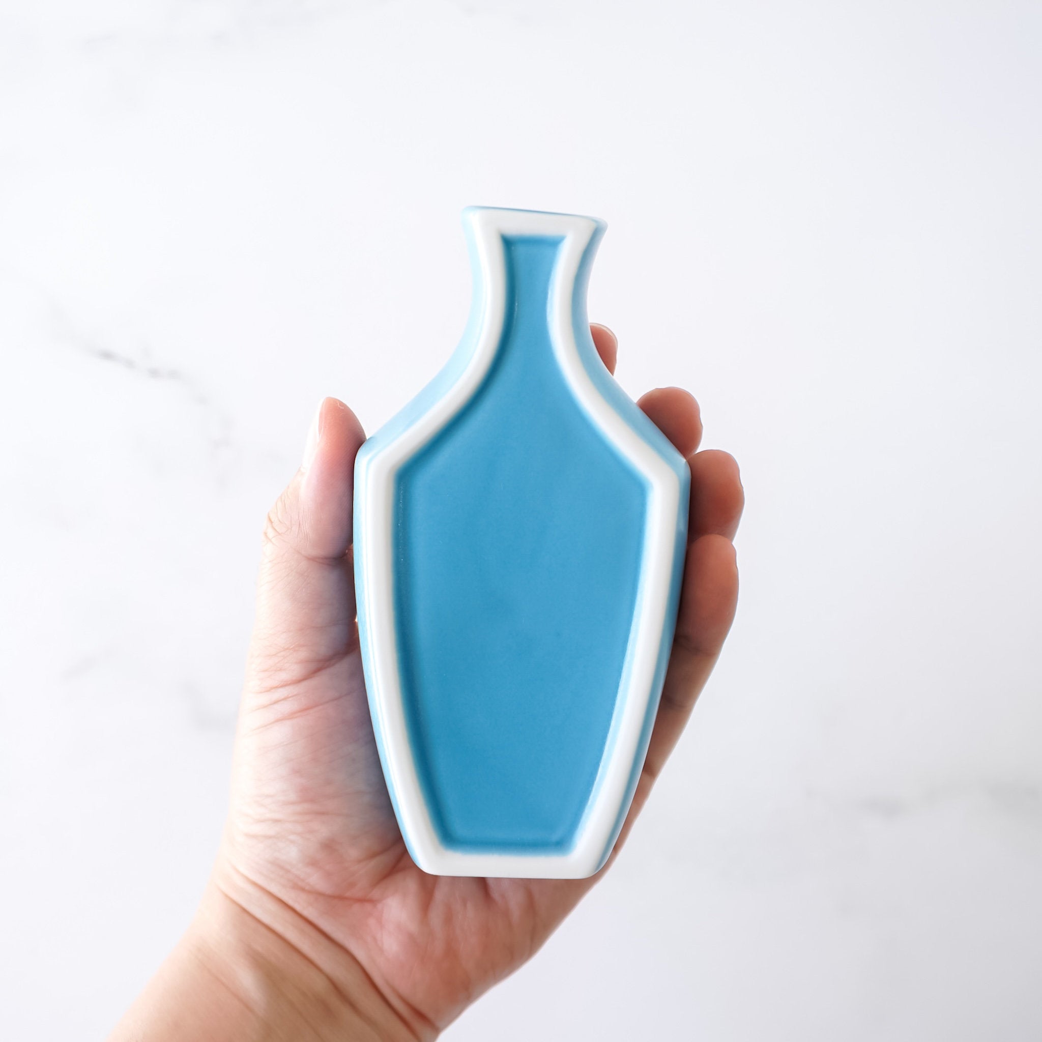 small flower vase in turquoise blue, made in Japan