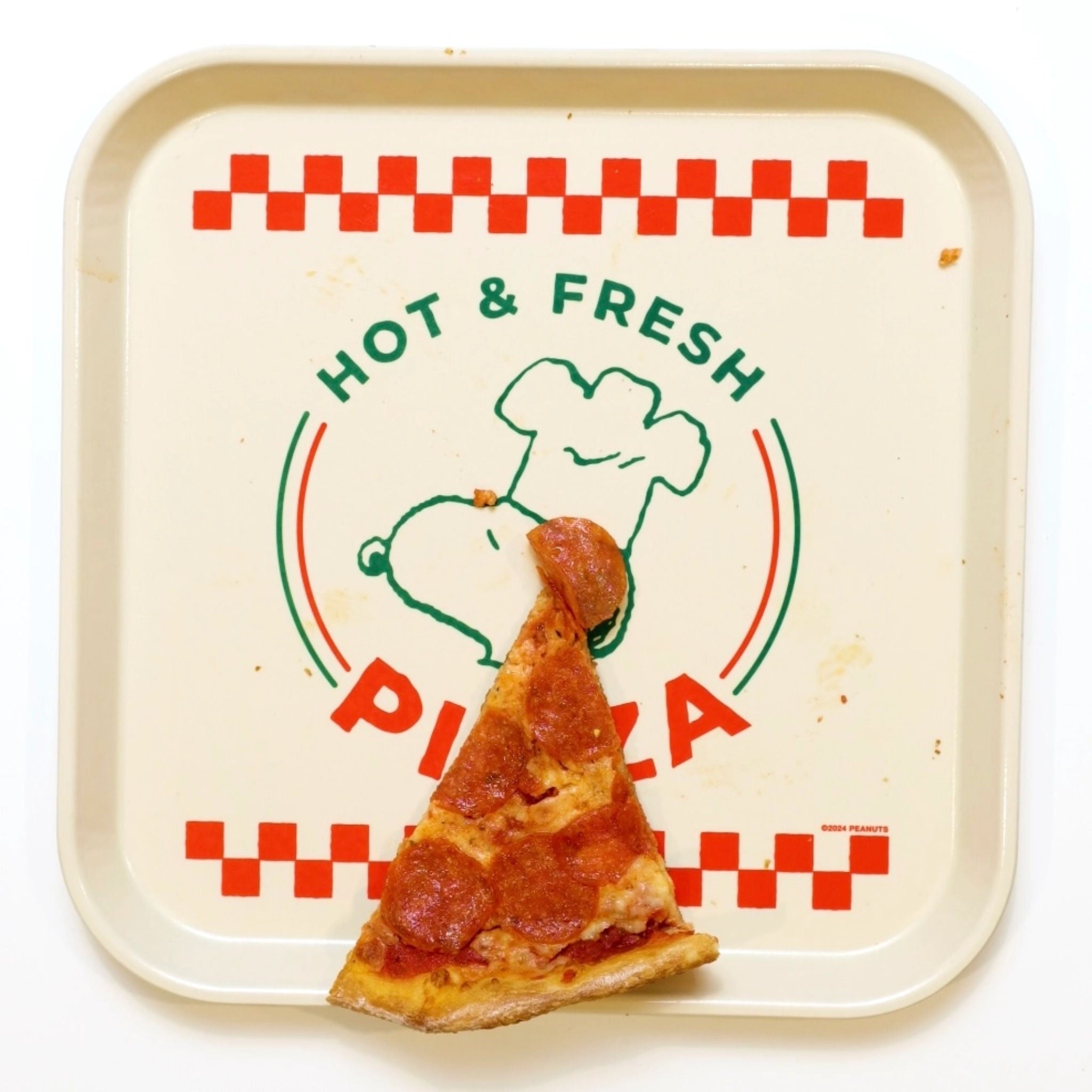 Snoopy tray with a slice of pepperoni pizza and &
