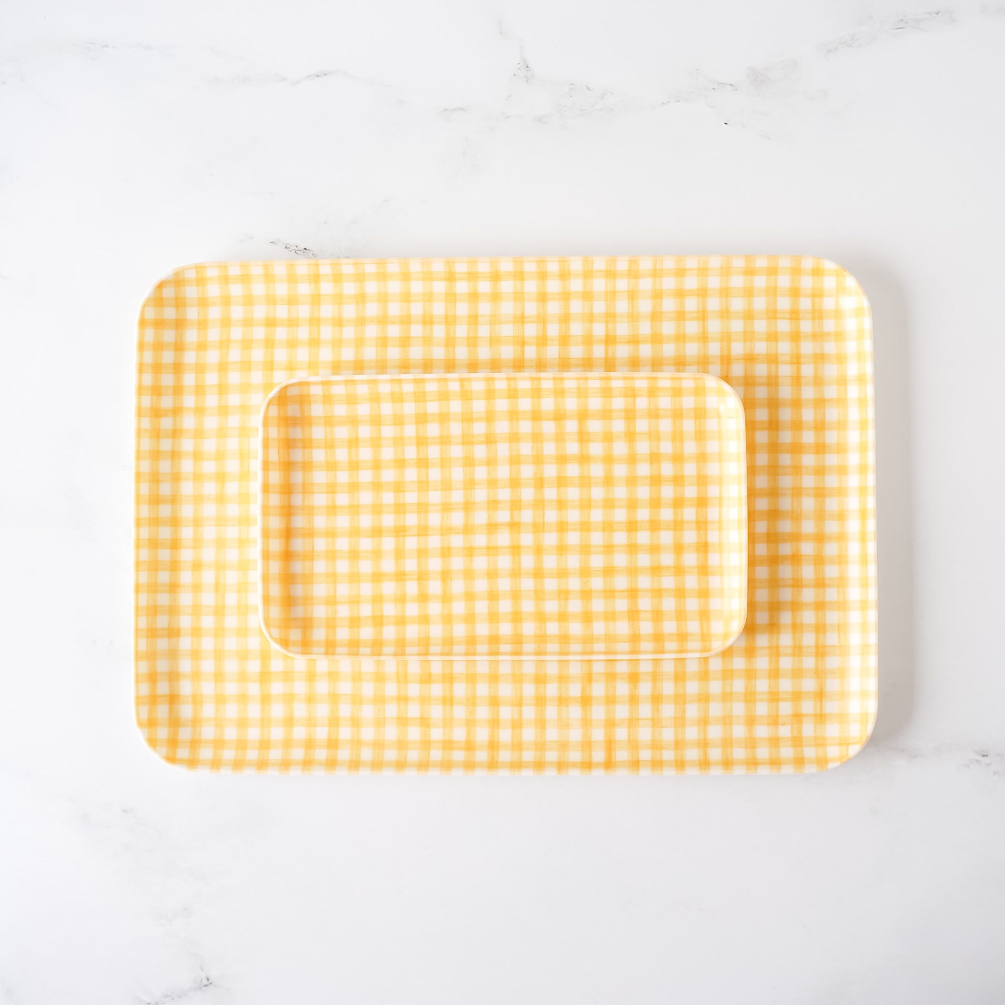 yellow white gingham check linen coated trays in small and medium