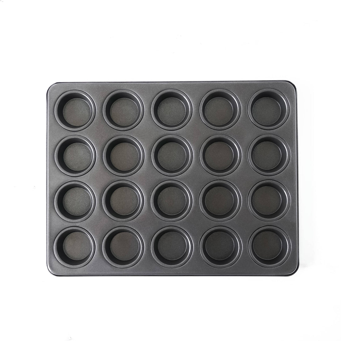 Black muffin tin with multiple compartments on a white background