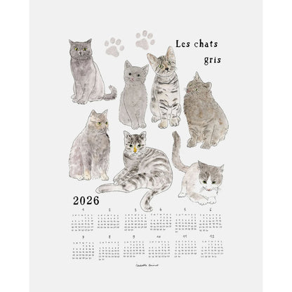 Calendar cloth hanging with illustrations of gray cats and paw prints on a white background
