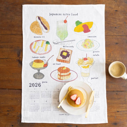 Calendar with illustrations of Japanese retro food on a wooden surface