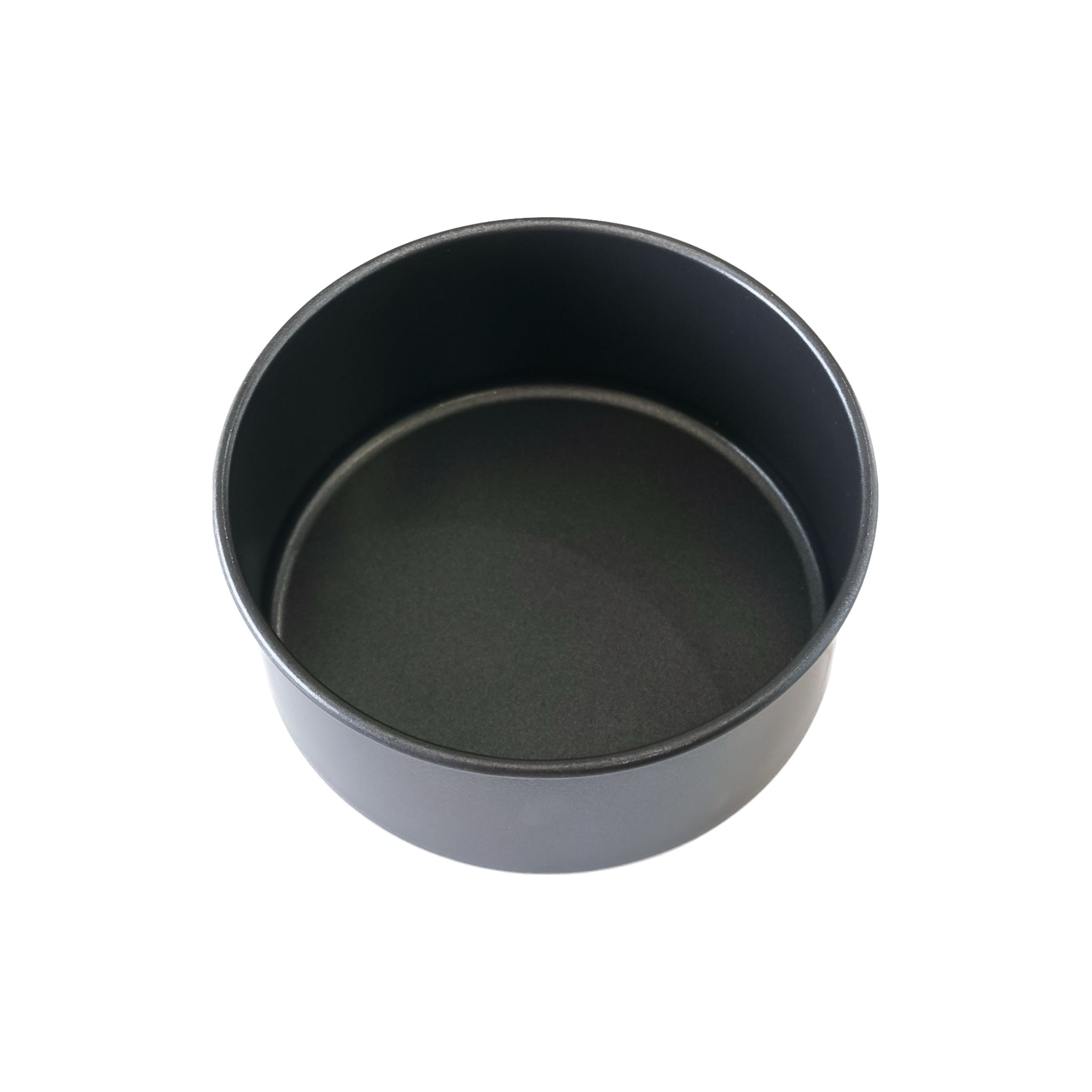 A black round cake pan with a non-stick surface.