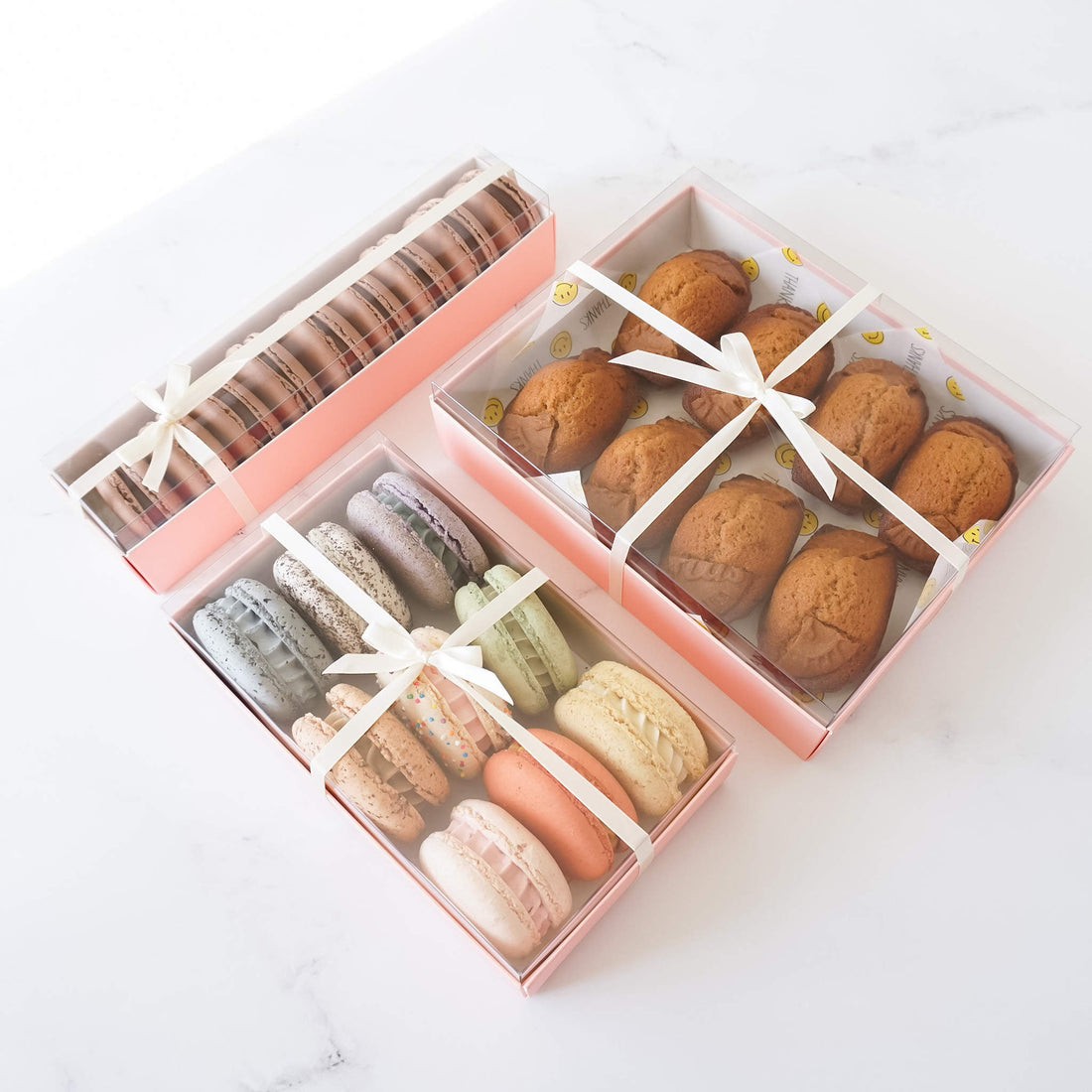 pink bakery boxes with clear lids 