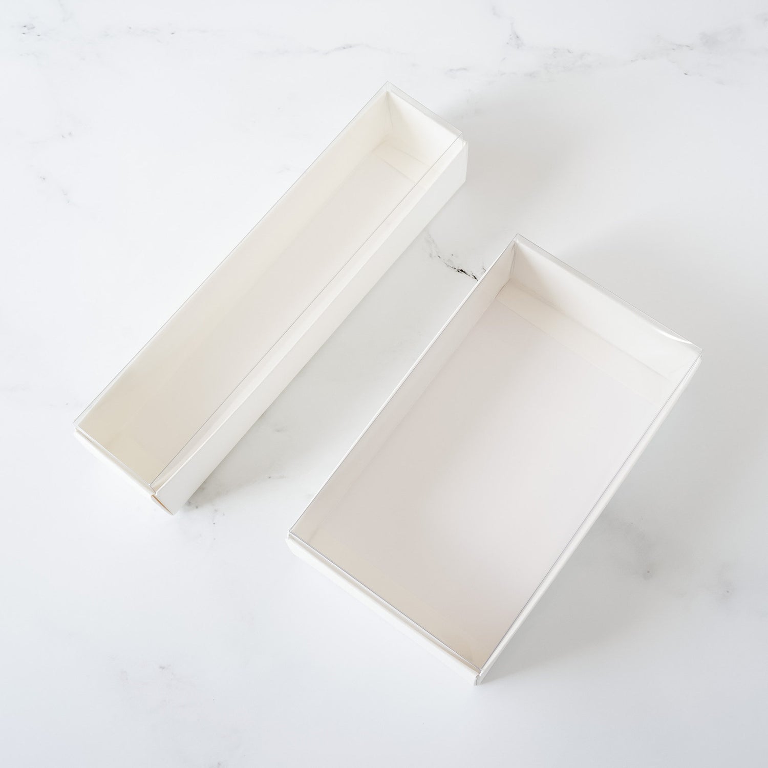 white bakery boxes with clear lids