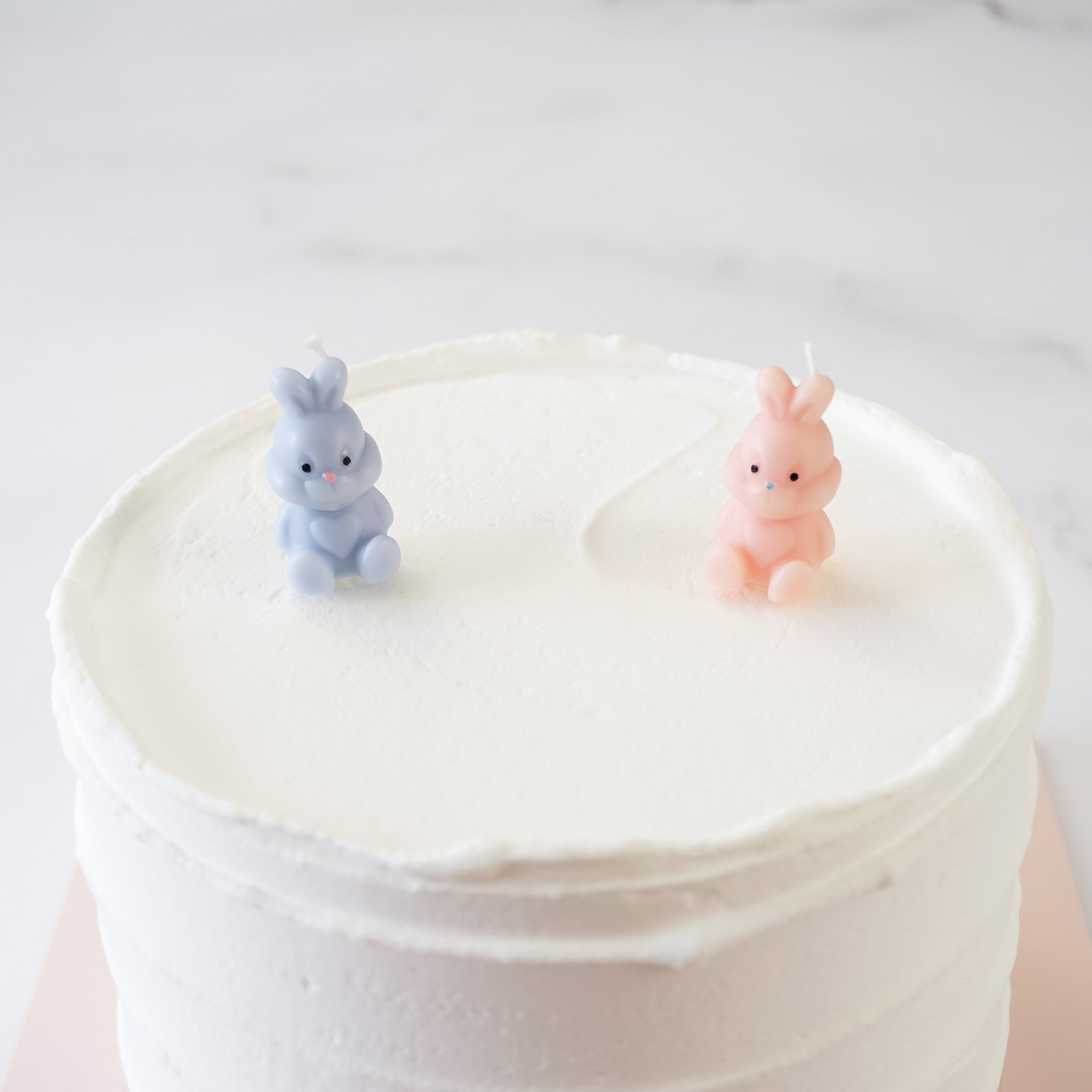 birthday cake candles in pink and lavender