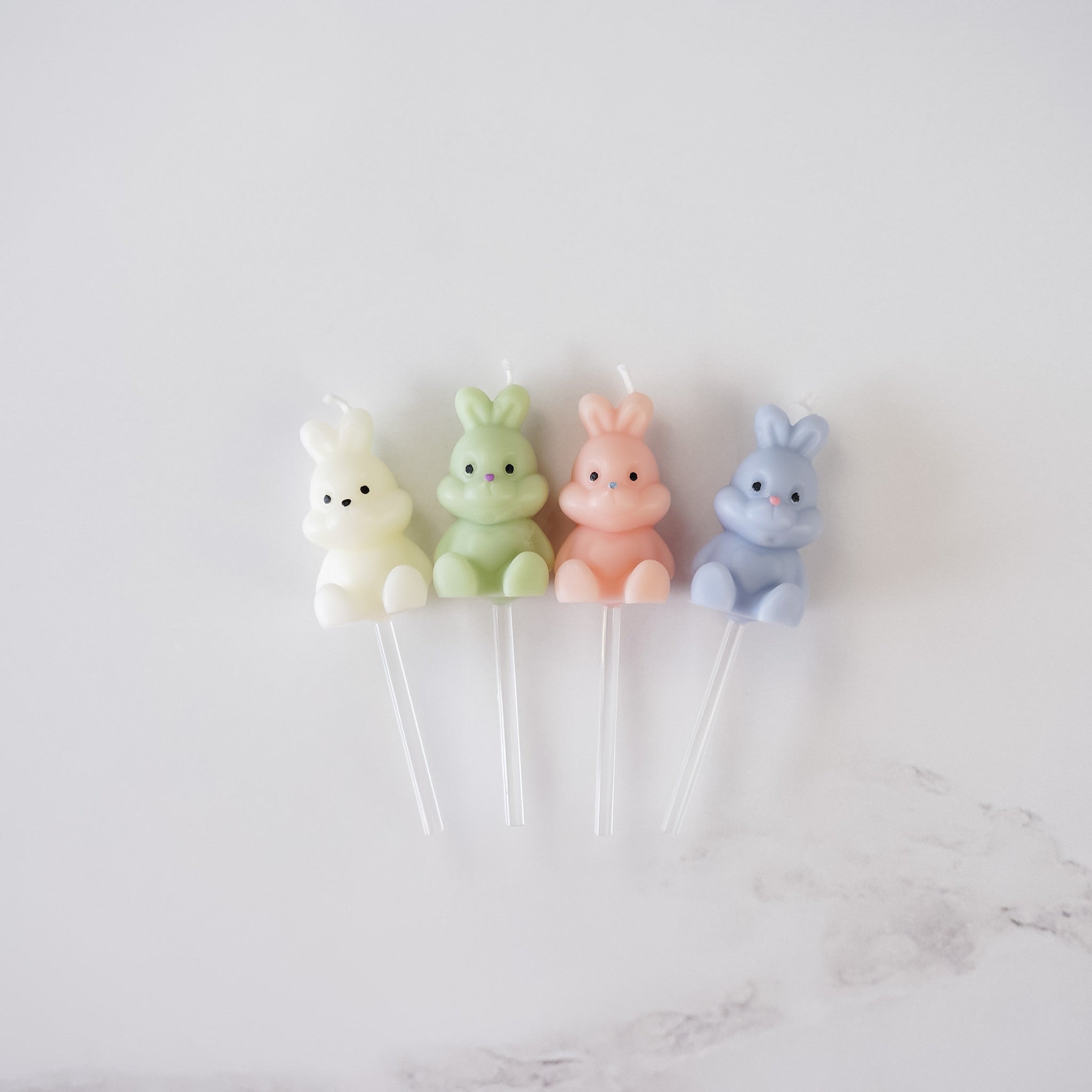 bunny birthday candles in white, green, pink, lavender