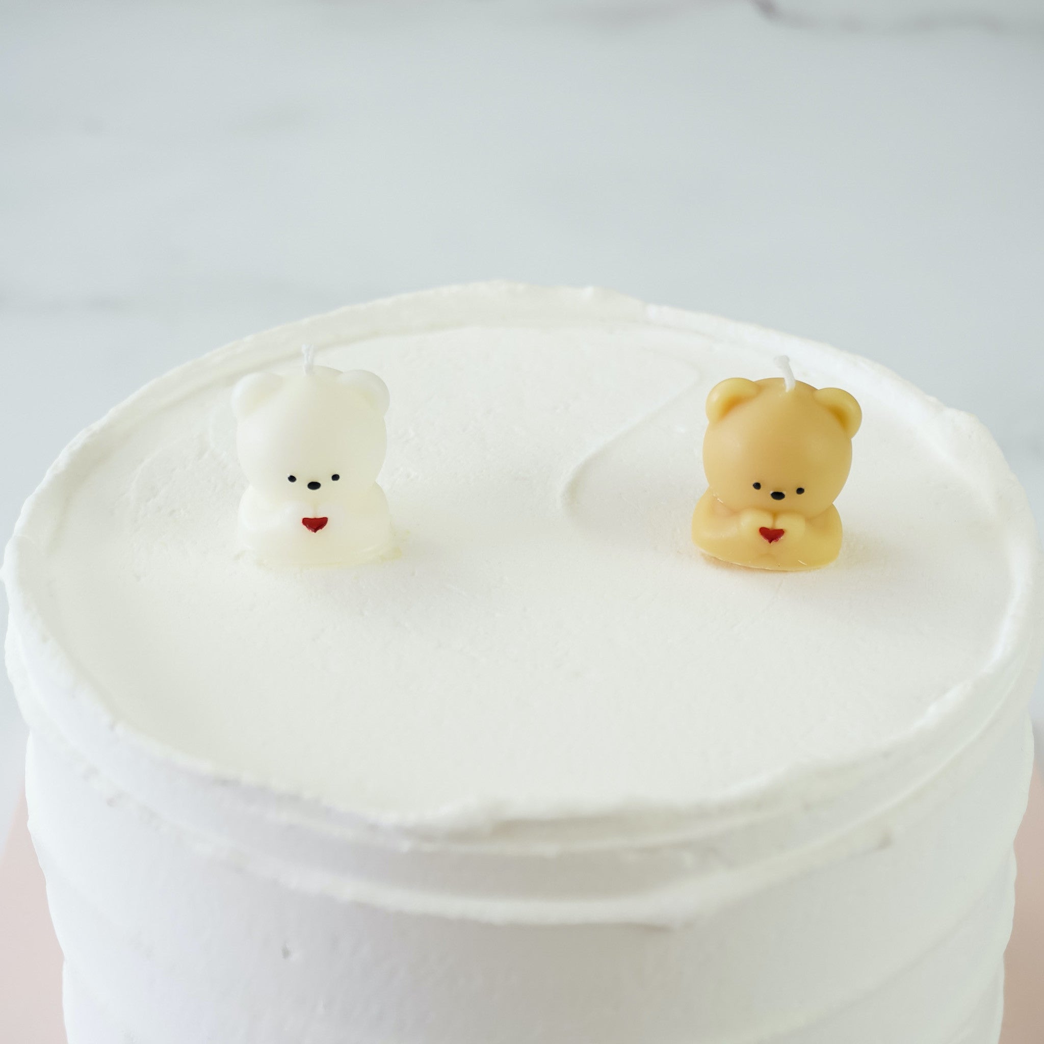 party candles in beige and white