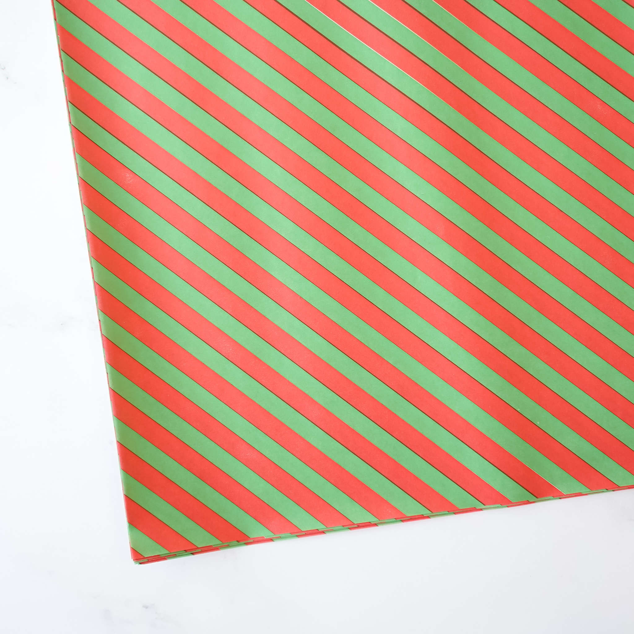 A deli paper with red and green stripes.