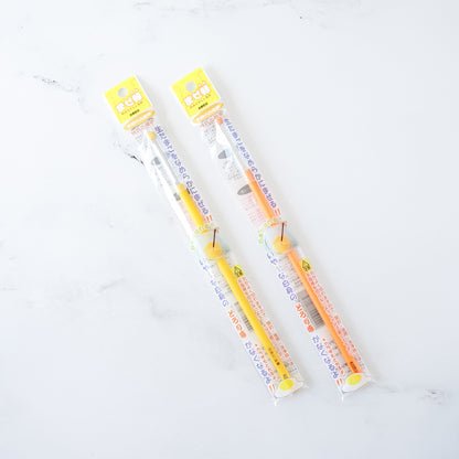 egg mixing stick in orange and yellow