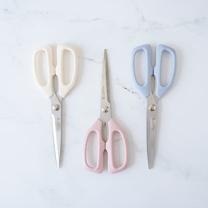 kitchen scissors in ivory, pink, and blue