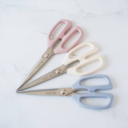 kitchen shears in pink, ivory, and blue