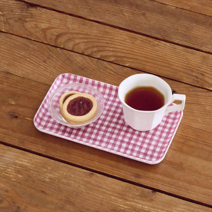 linen coated serving tray in dark pink and white