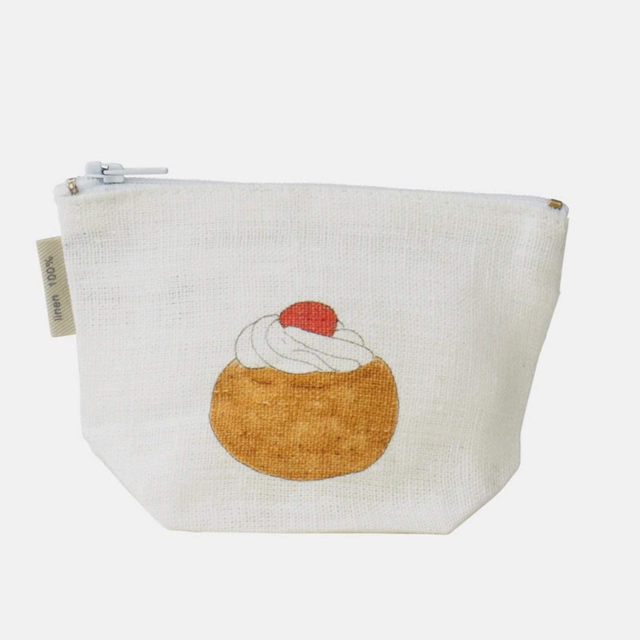 Small linen pouch with a cupcake design on a white background