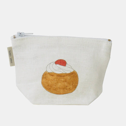 Small linen pouch with a cupcake design on a white background