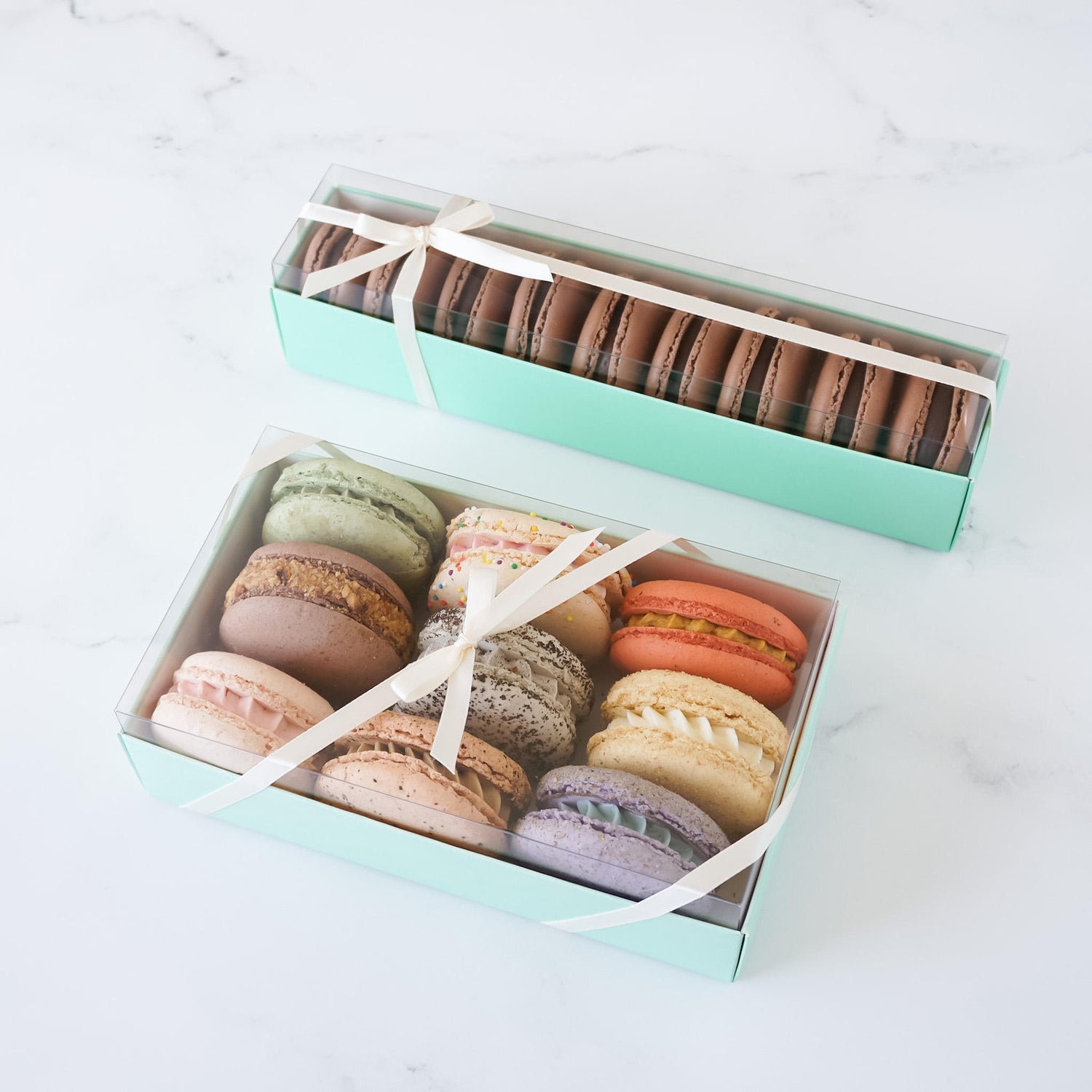 macaron bakery boxes in mint green