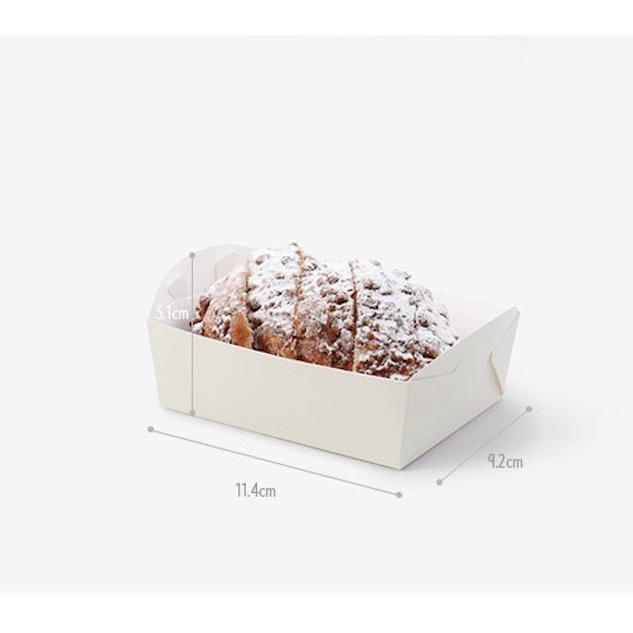 A white rectangular paper food container with a pastry inside. The container is 11.4cm long, 9.2cm wide, and 5.1cm high.