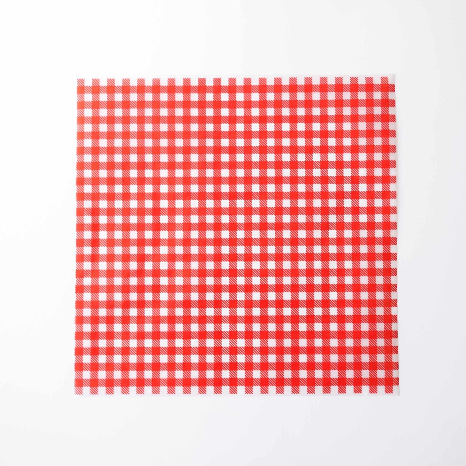 Red and white checkered parchment paper on a white background