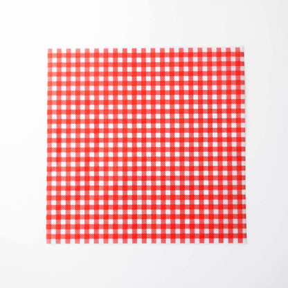 Red and white checkered parchment paper on a white background