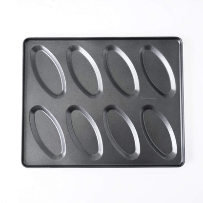A dark gray non-stick salt bread baking pan with eight elongated oval-shaped cavities, shown from a top-down view on a white background.