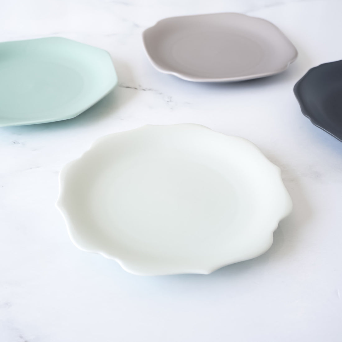 side plates in porcelain, mint, charcoal, greige