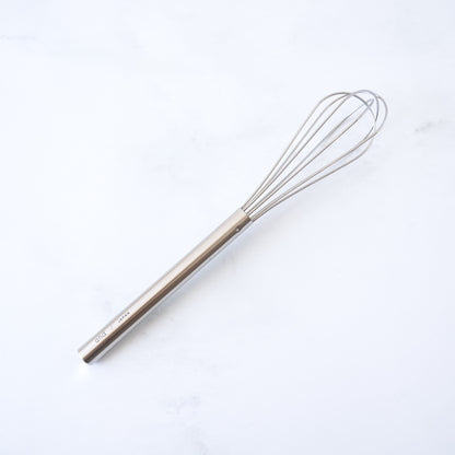 stainless steel mini whisk on a white background