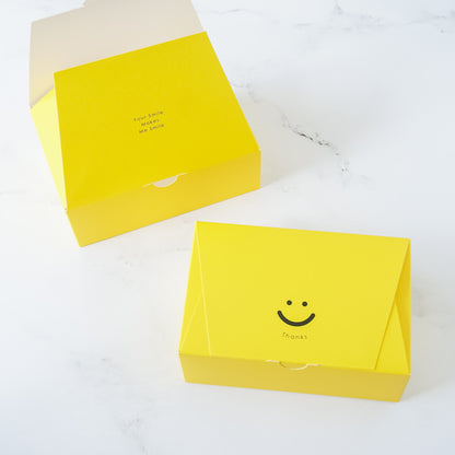 smile cookie boxes in yellow