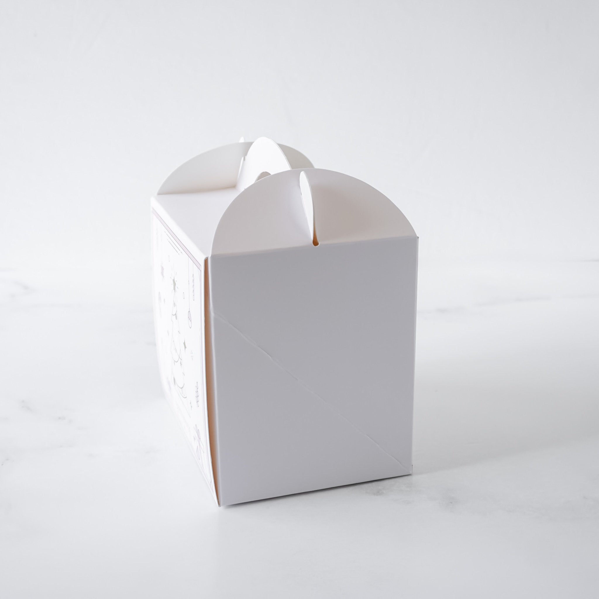 White paper bakery box on a white background
