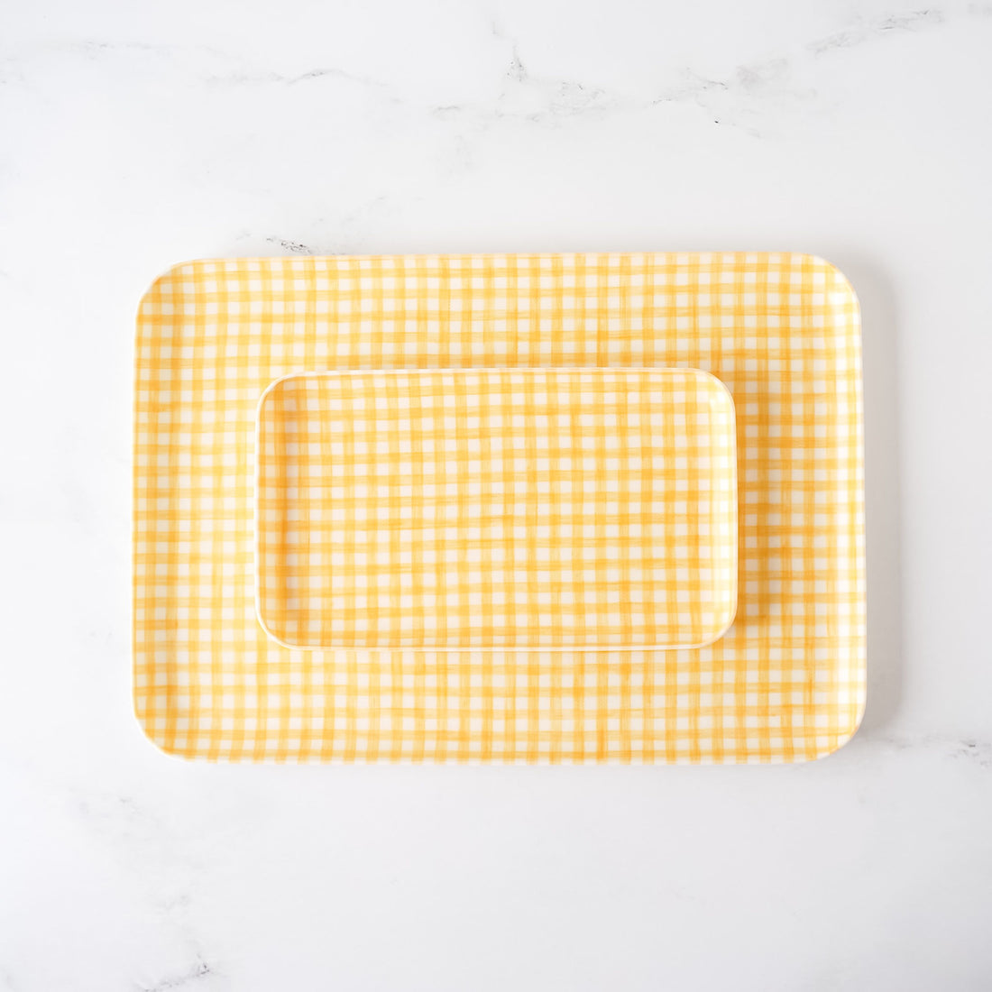 yellow white gingham check linen coated trays in small and medium